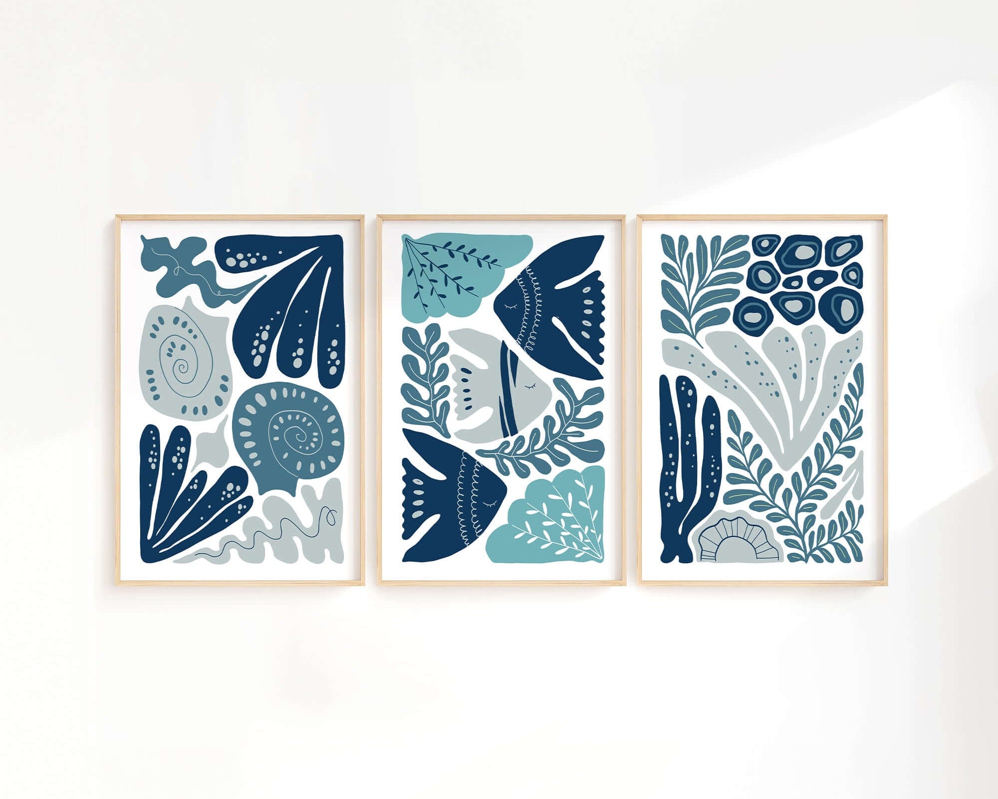 The Ocean Blocks Triptych | Set of Three Prints | 303 features blue and white abstract botanical and fish designs, perfect as wall art to elevate your home decor.