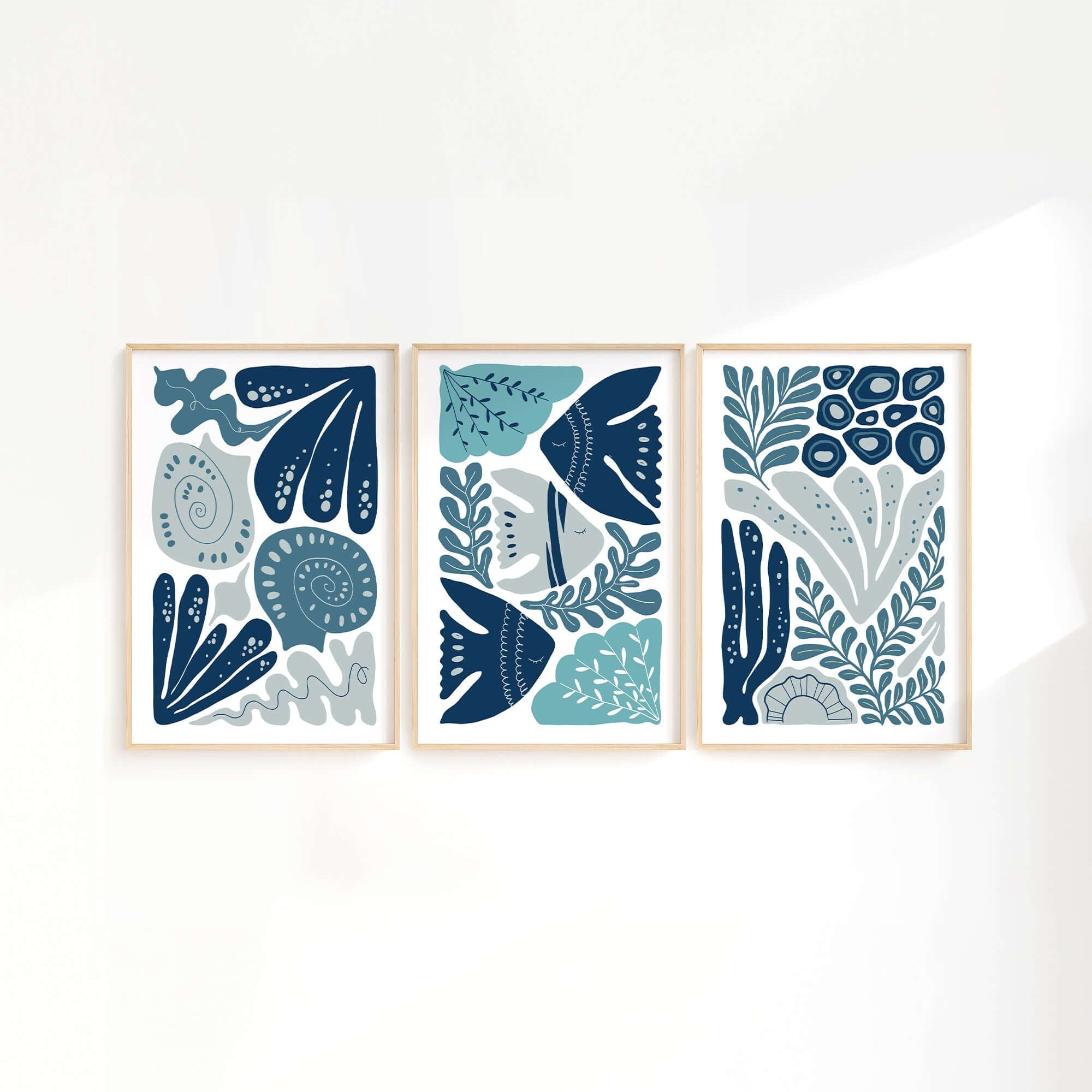 The Ocean Blocks Triptych | Set of Three Prints | 303 features blue and white abstract botanical and fish designs, perfect as wall art to elevate your home decor.
