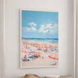 a lively beach scene with numerous people enjoying the sunny day under colorful umbrellas.