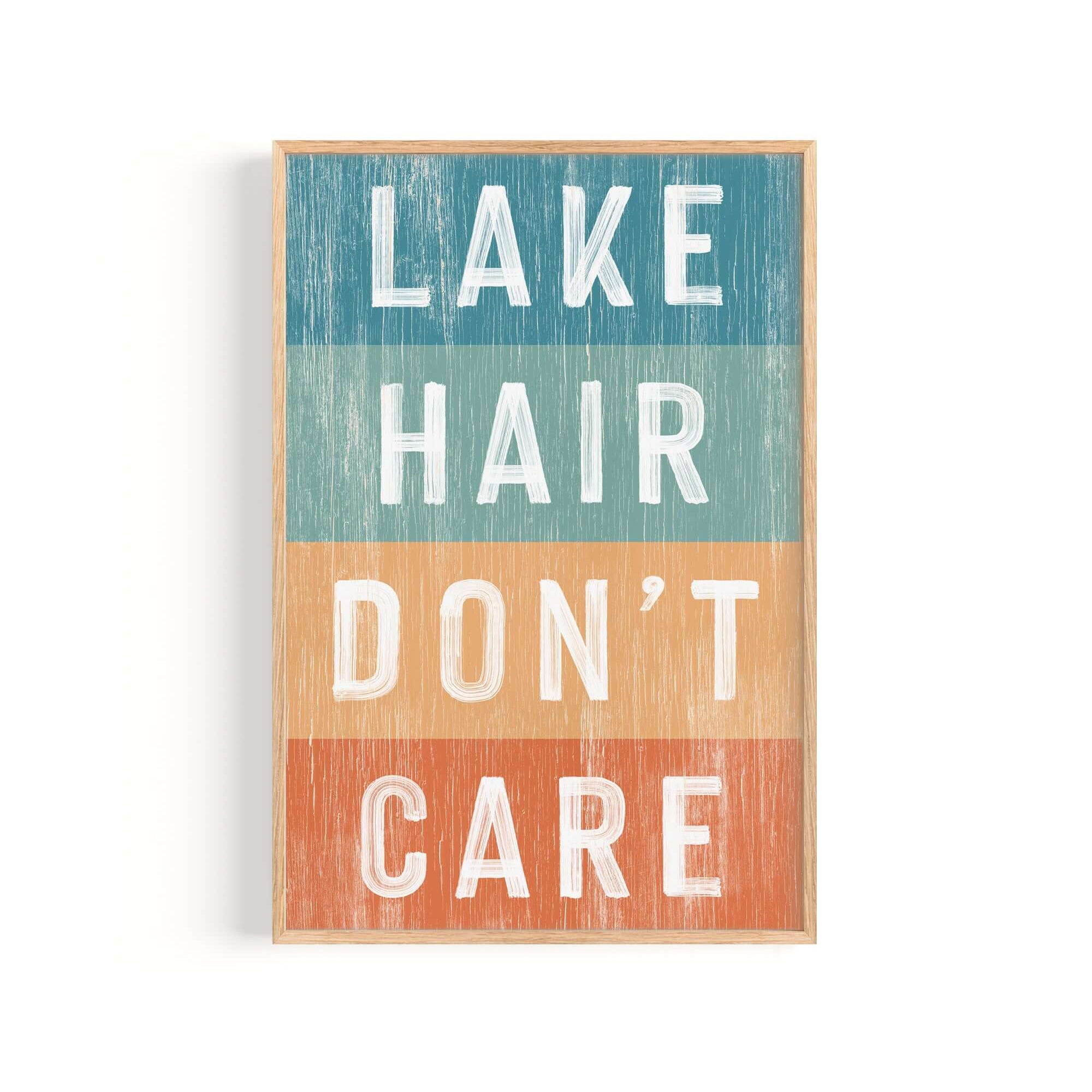 a wooden sign that says lake hair don't care