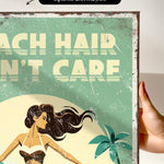 The image is a vintage-style canvas print featuring a woman with long hair and a tropical background.