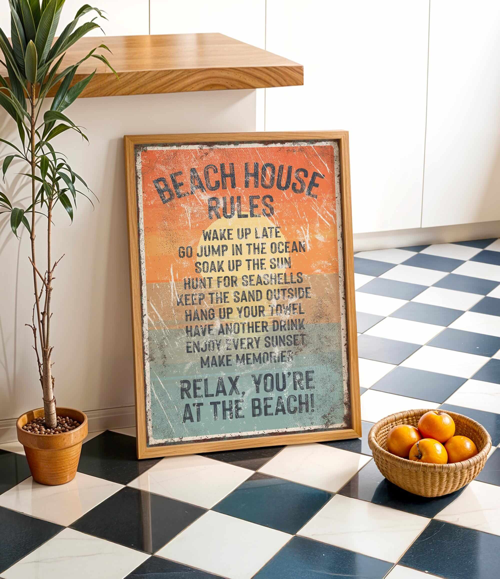 a beach house rule sign on a checkered floor, with a potted plant to the left and a basket of oranges to the right.