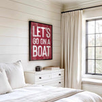 a bedroom with a bed, dresser and window