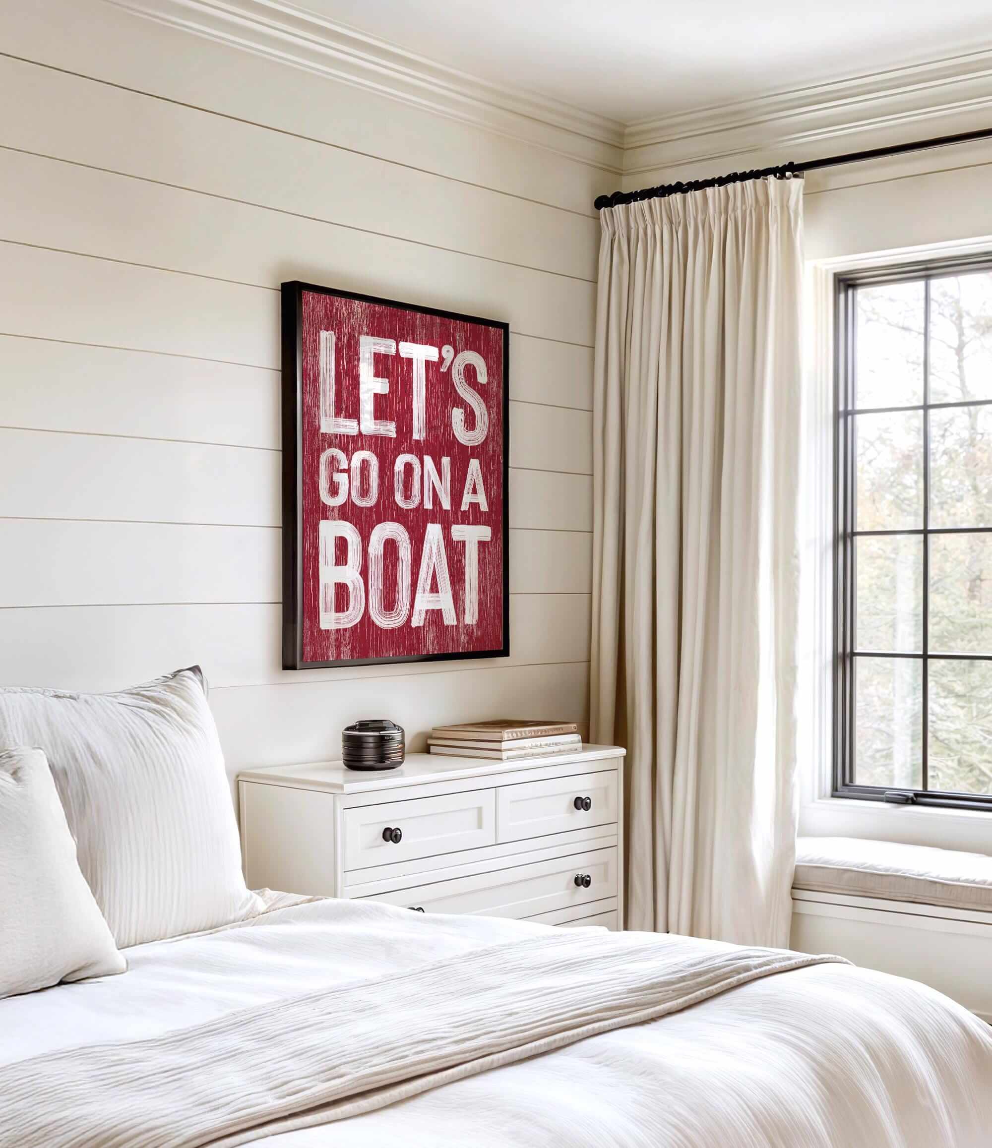 a bedroom with a bed, dresser and window