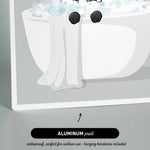 a black cat sitting in a white bathtub filled with bubbles, with its paws hanging over the edge.