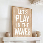 a wooden sign that says let&#39;s play in the waves