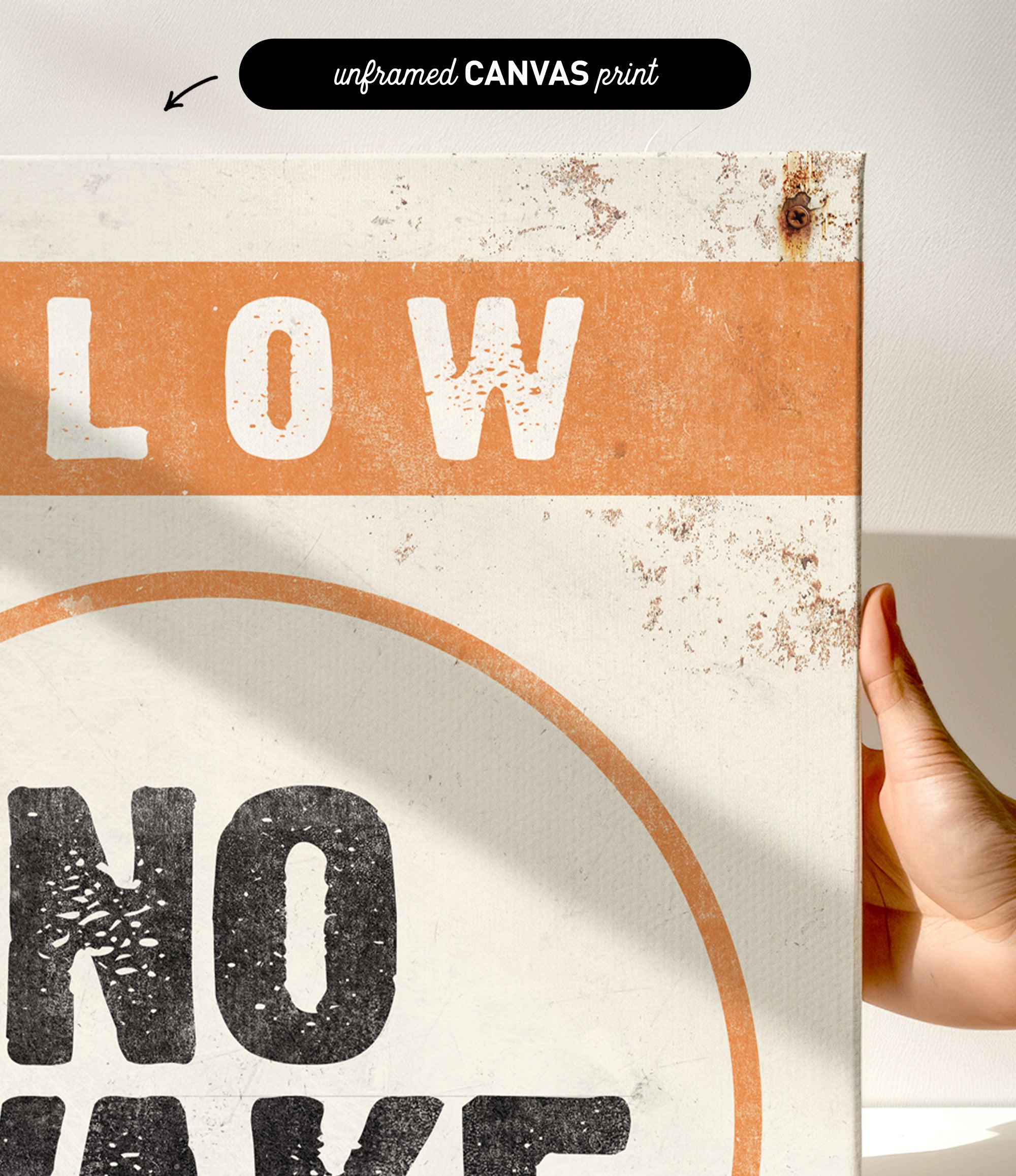 a hand holding a sign that says slow no wave