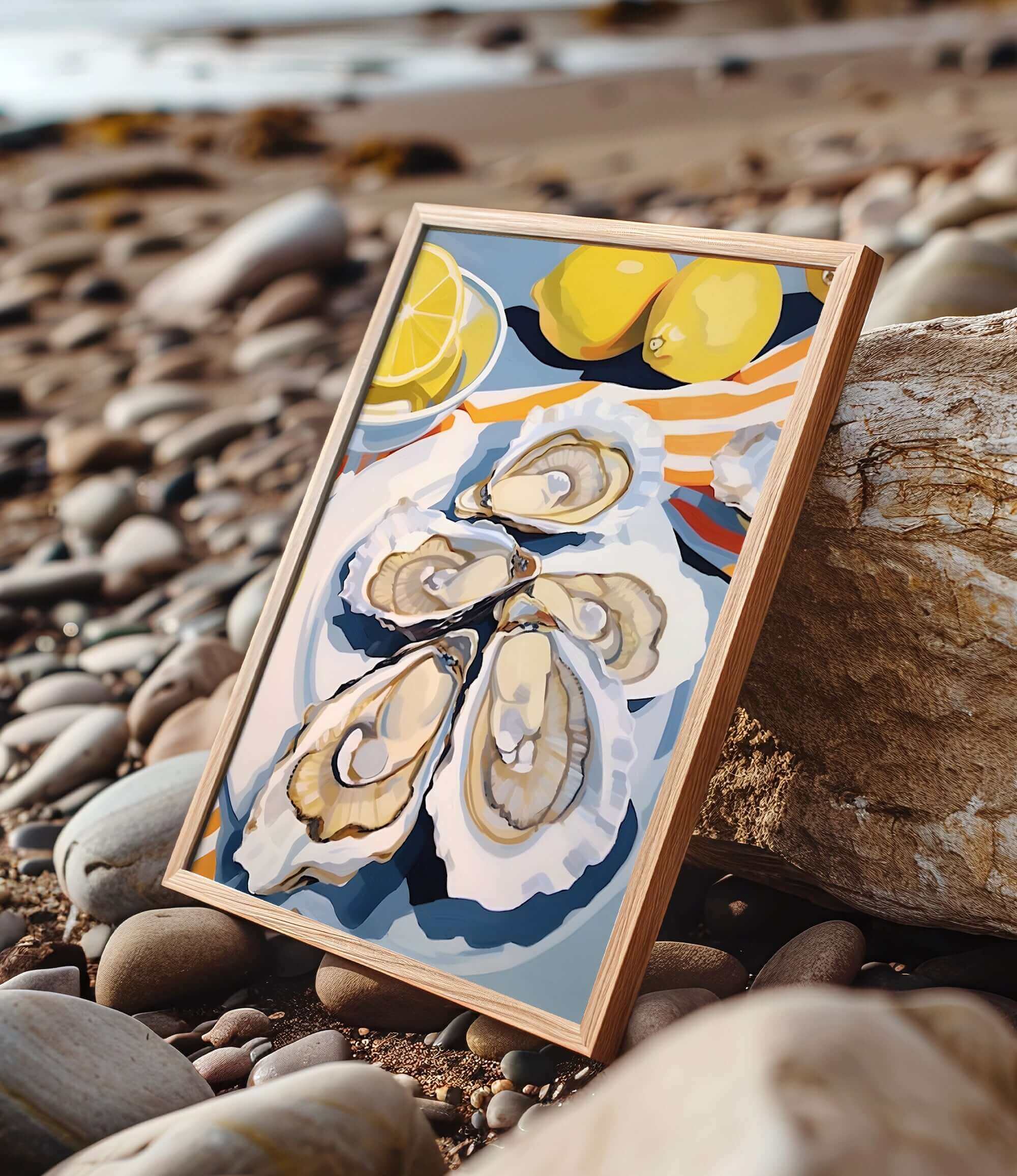 A framed painting of a seashell with a lemon slice on top, placed on a rocky beach.