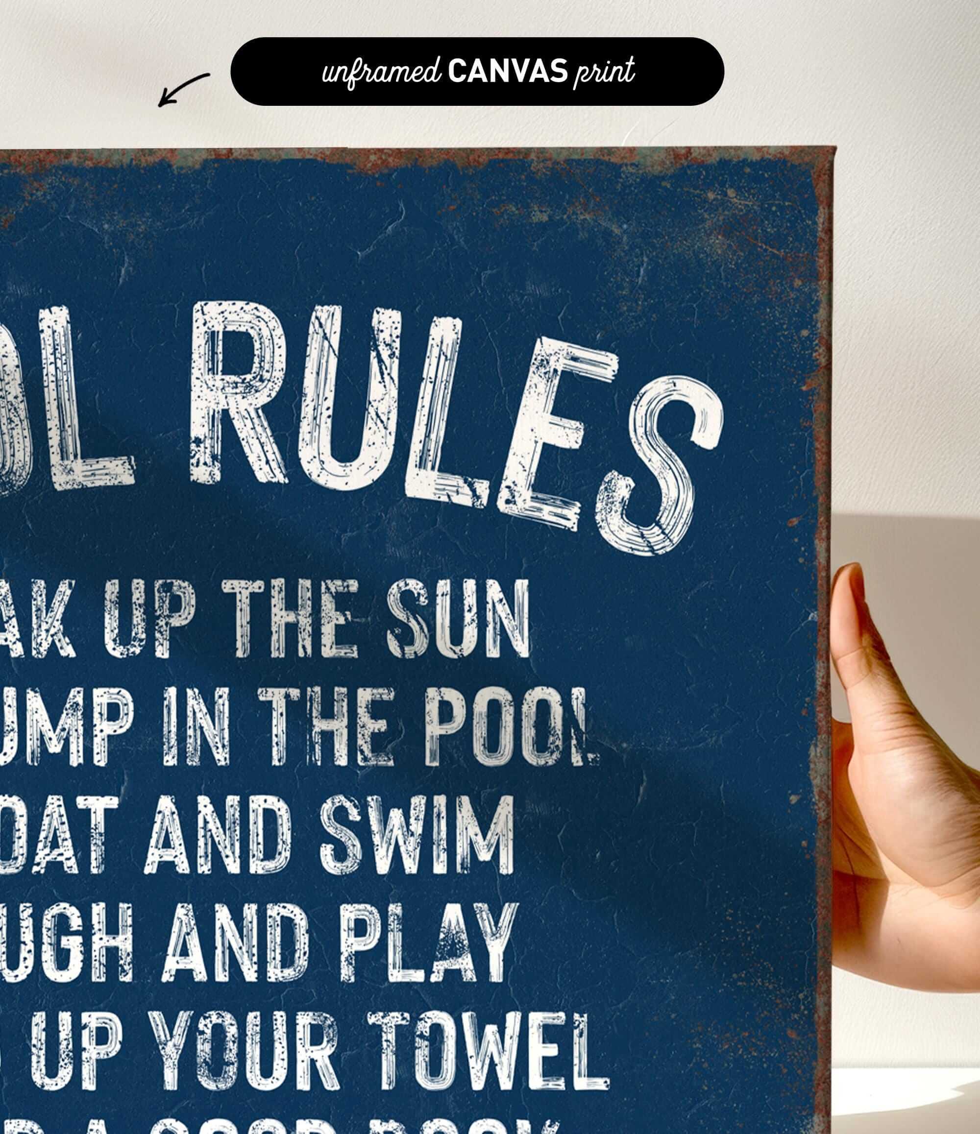 a hand holding a sign that says pool rules