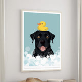 A framed illustration of a black dog with a yellow rubber duck on its head, set against a blue background with white bubbles.