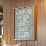 a sign hanging on the wall of a restaurant