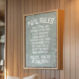 a sign hanging on the wall of a restaurant