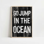 a black and white poster with the words go jump in the ocean