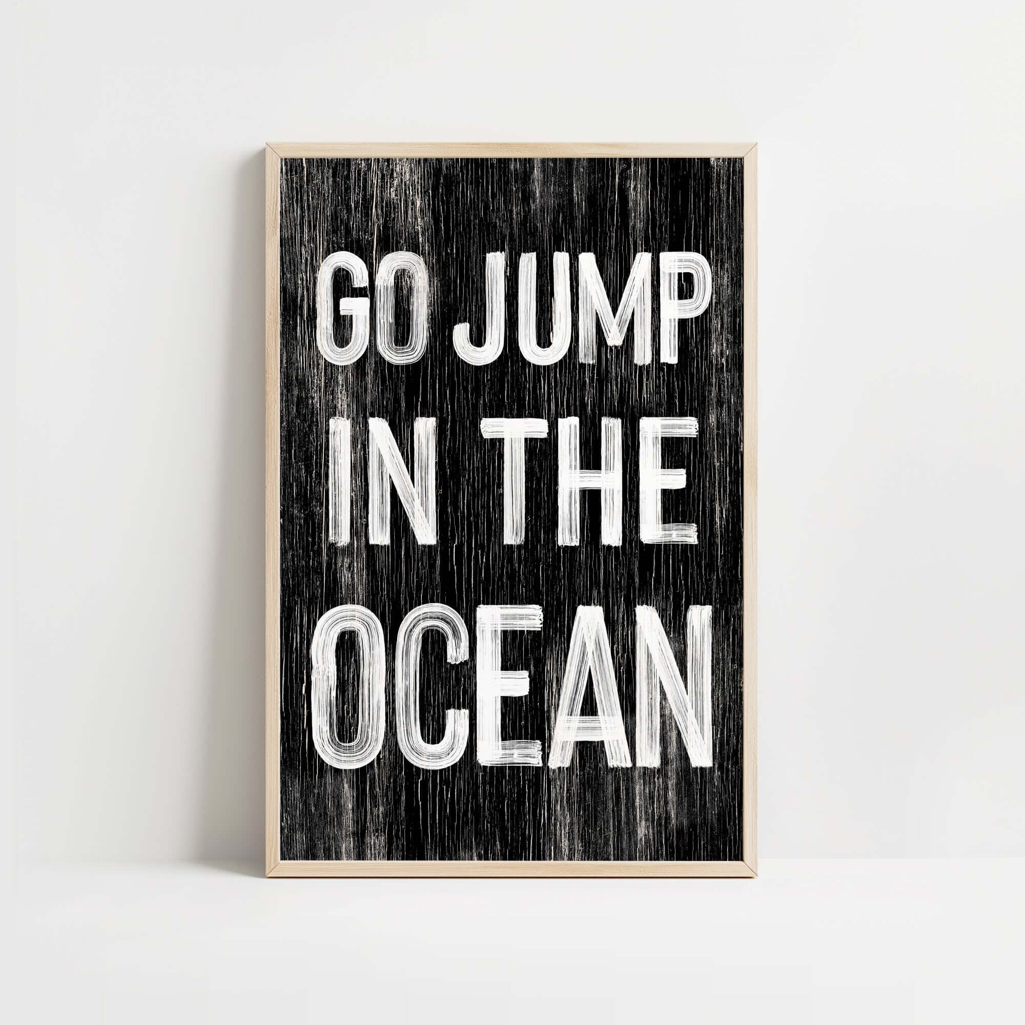 a black and white poster with the words go jump in the ocean