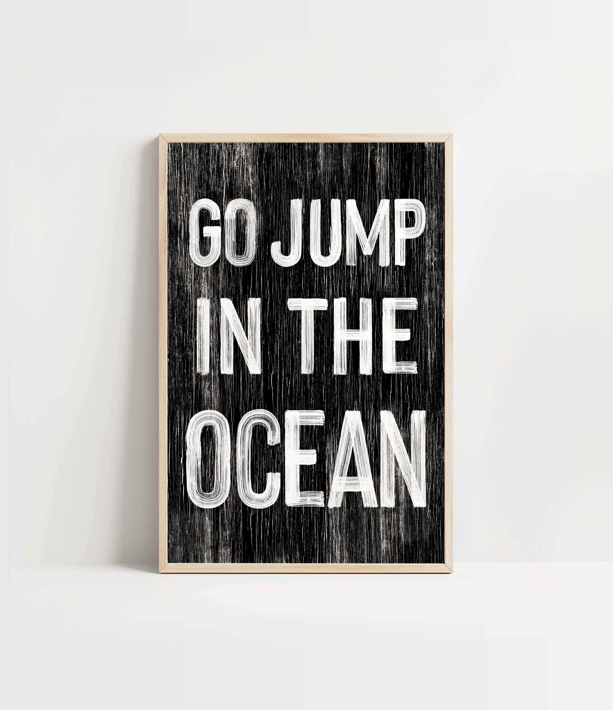 a black and white poster with the words go jump in the ocean