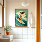 a bathroom with a framed illustration of a woman surfing on a wave, a potted plant, a sink, and a towel.