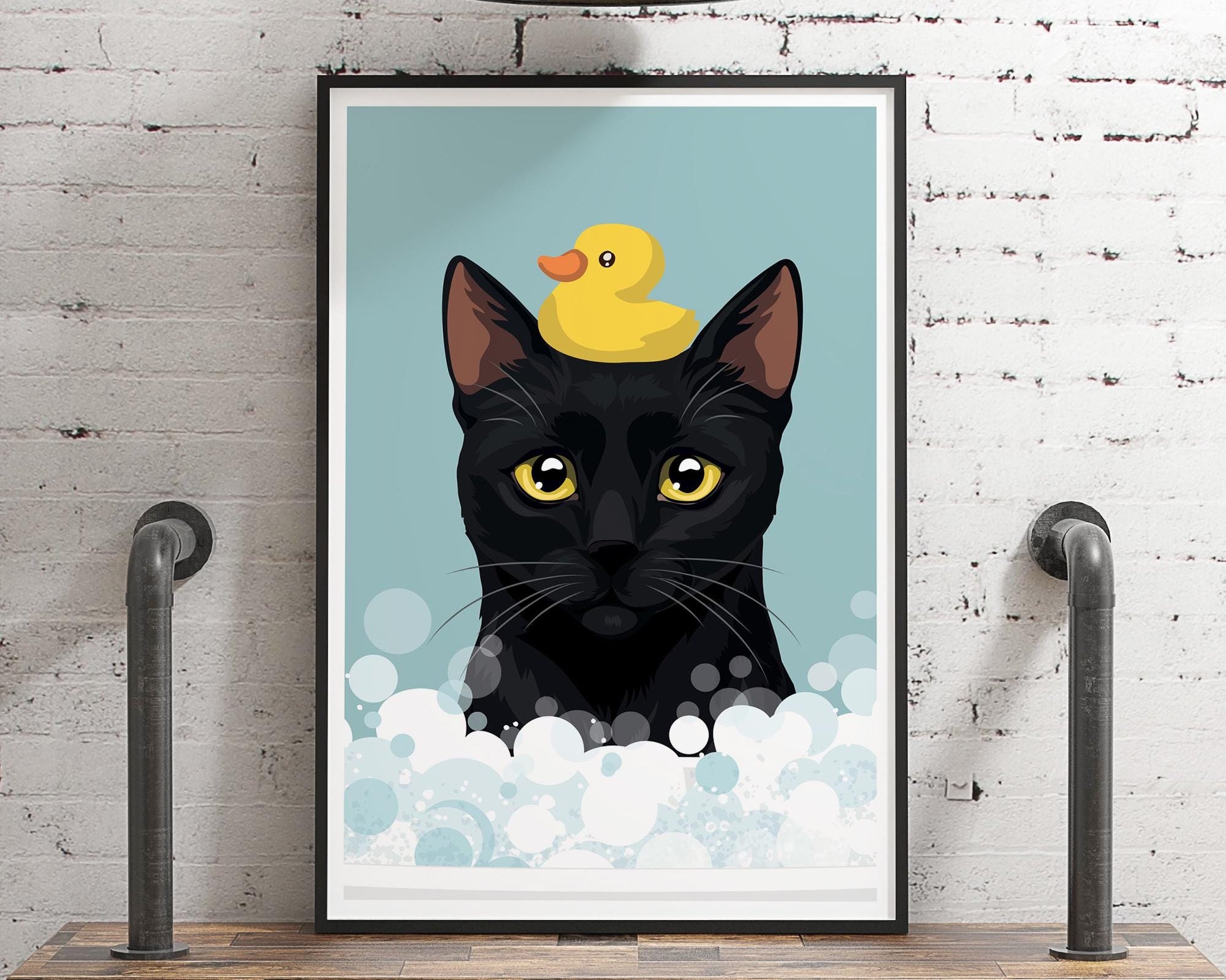 A framed illustration of a black cat with a yellow rubber duck on its head, set against a blue background with white bubbles.