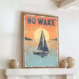 a picture of a sailboat on a poster above a fireplace