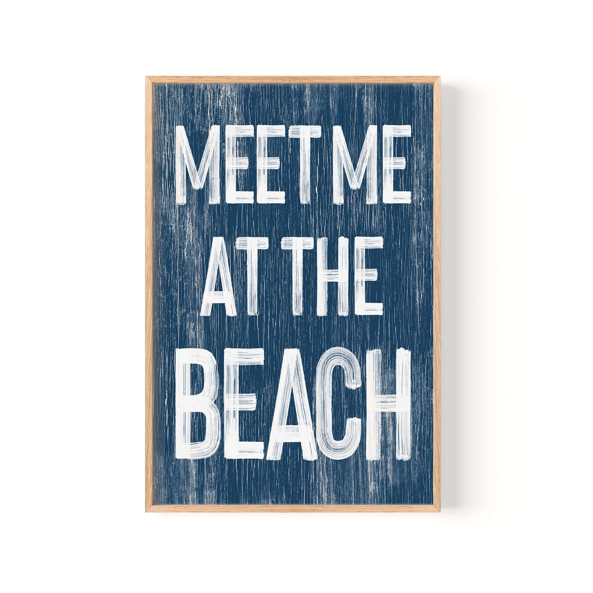 a wooden sign that says meet me at the beach