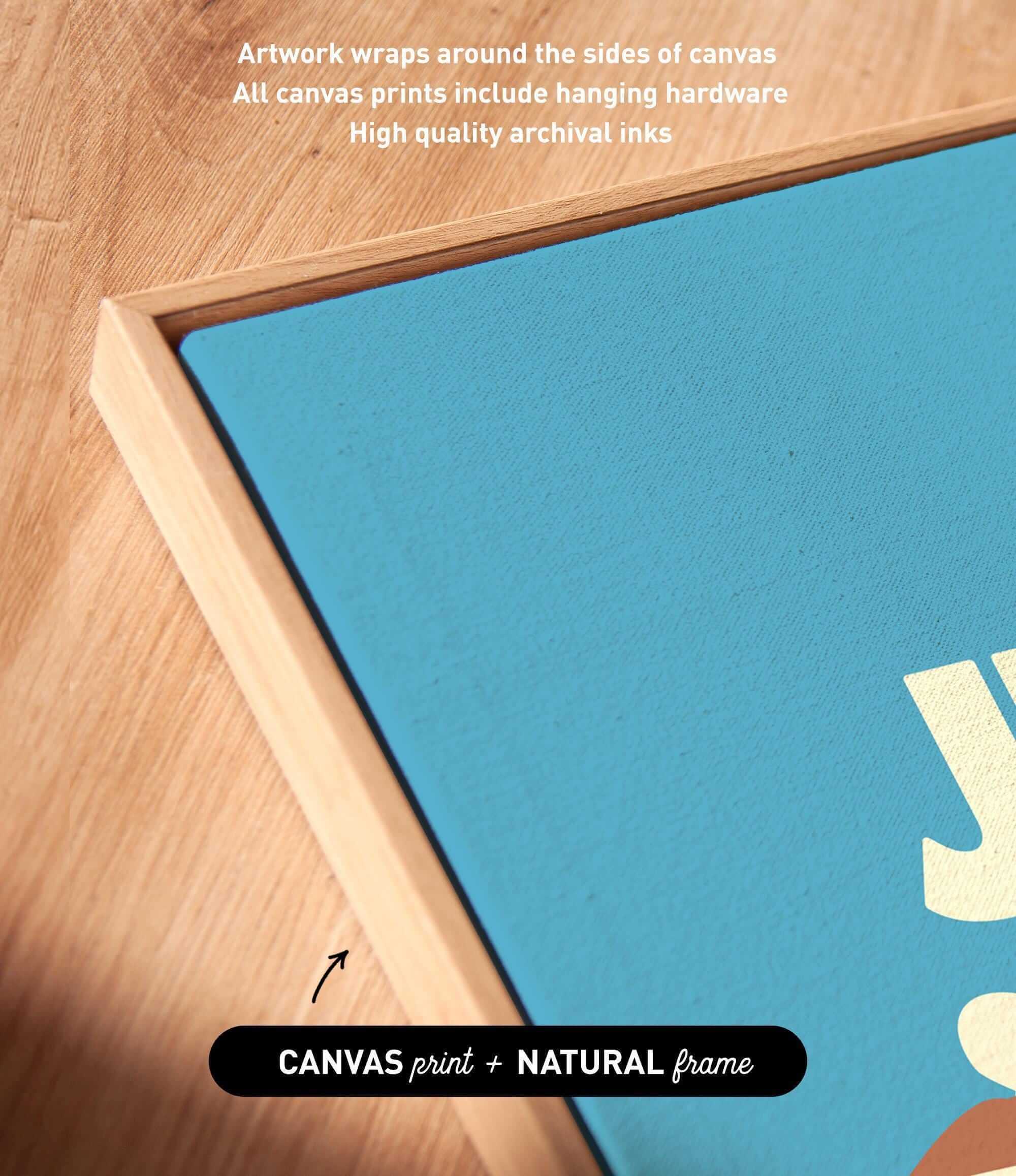 a close-up view of a blue canvas with artwork wrapped around the sides, and a wooden frame.