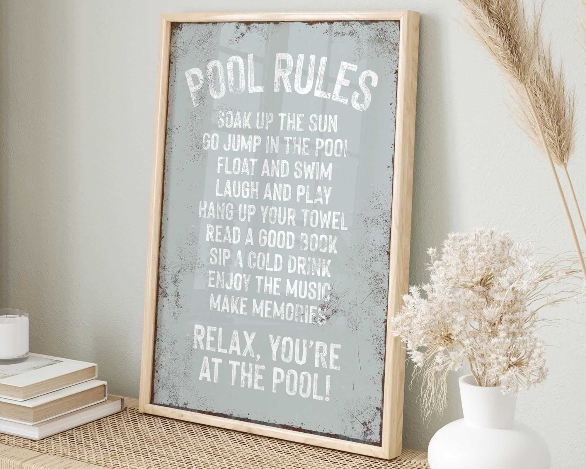 a picture of a pool rules sign on a shelf