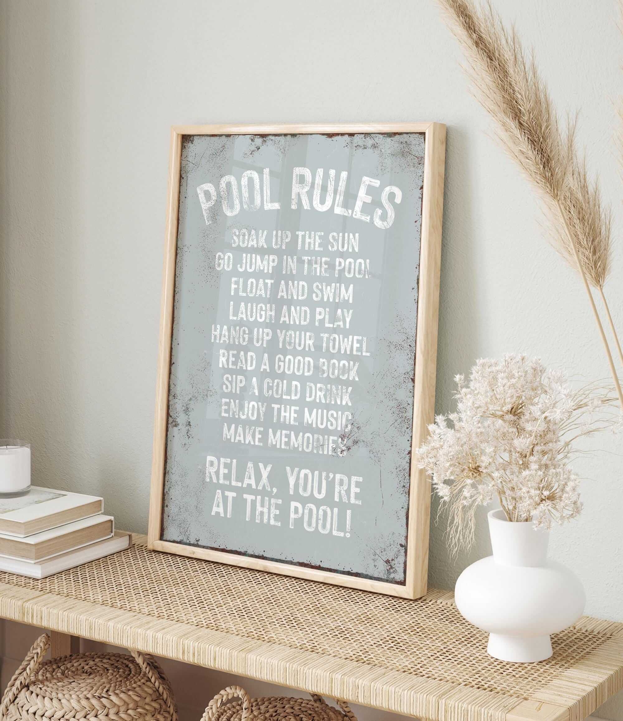 a picture of a pool rules sign on a shelf