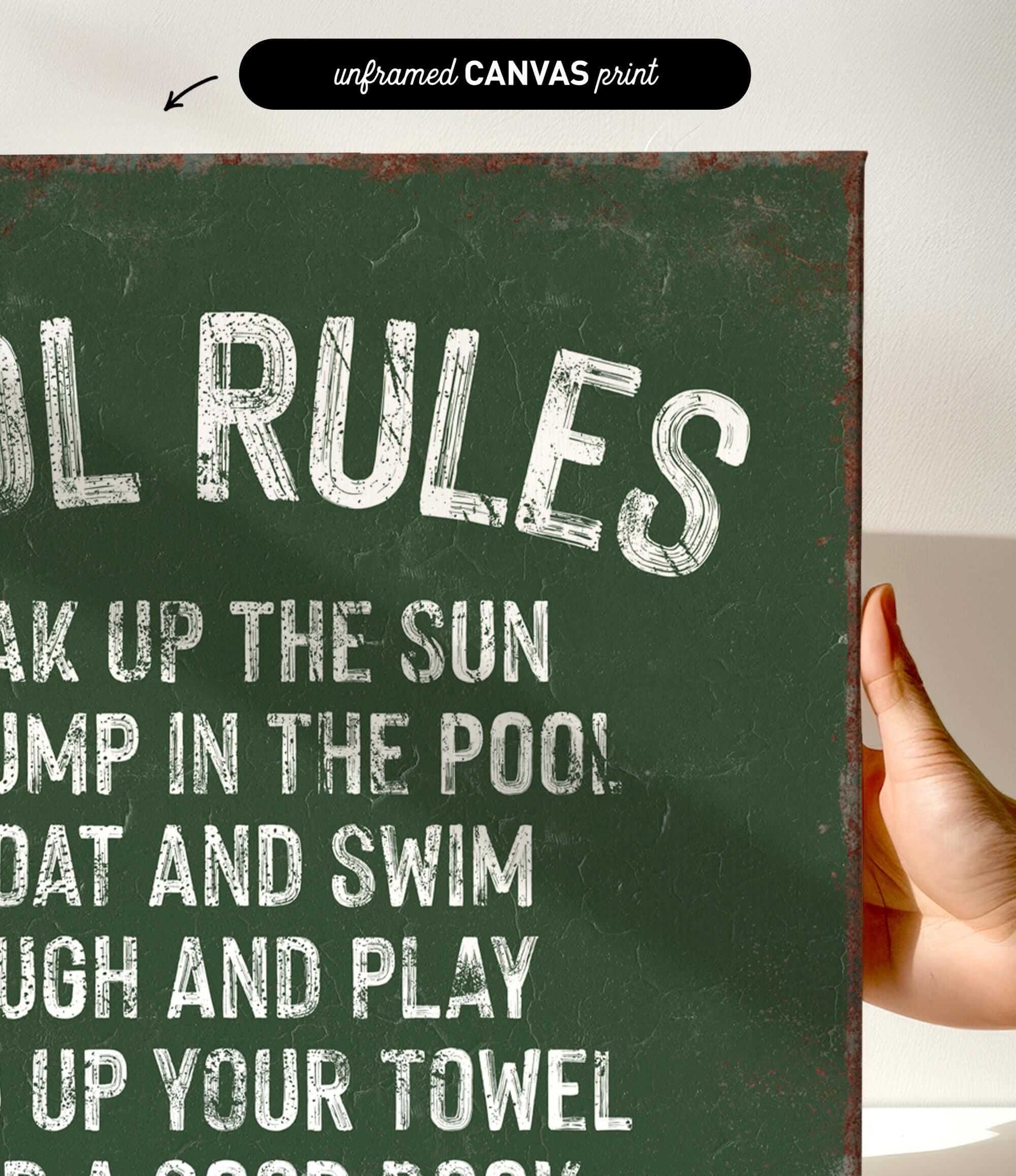 a hand holding a sign that says pool rules