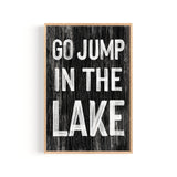 a black and white sign that says go jump in the lake