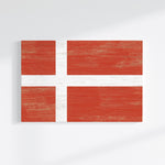 a piece of wood with a flag painted on it