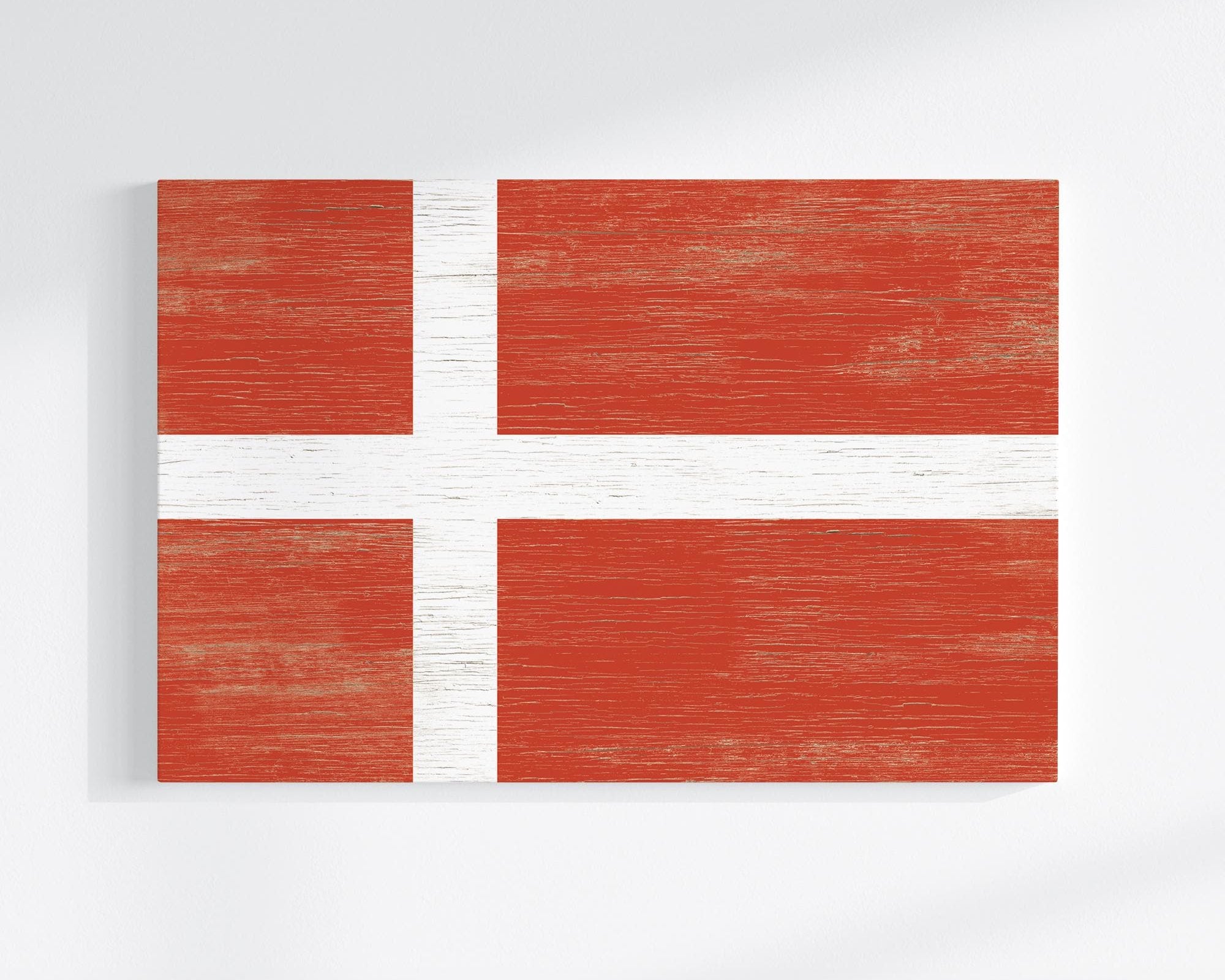 a piece of wood with a flag painted on it