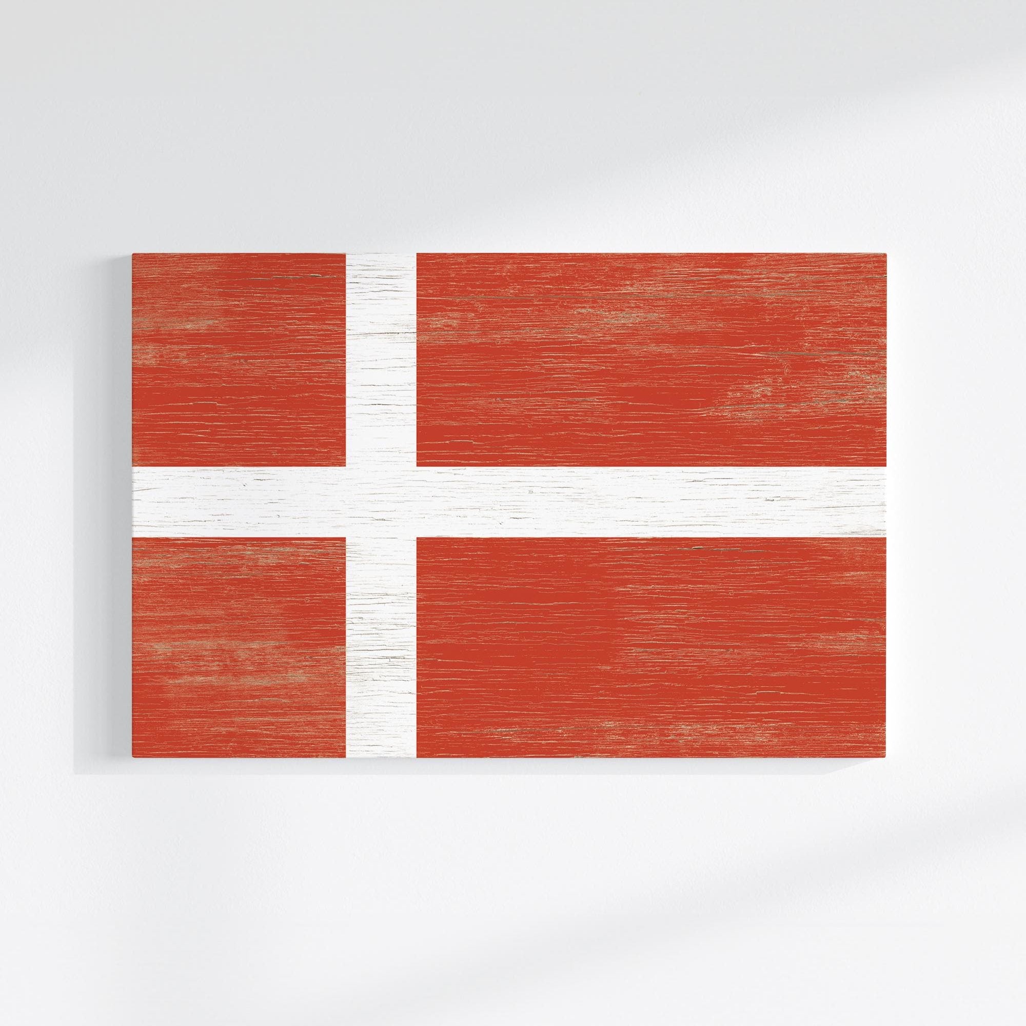 a piece of wood with a flag painted on it