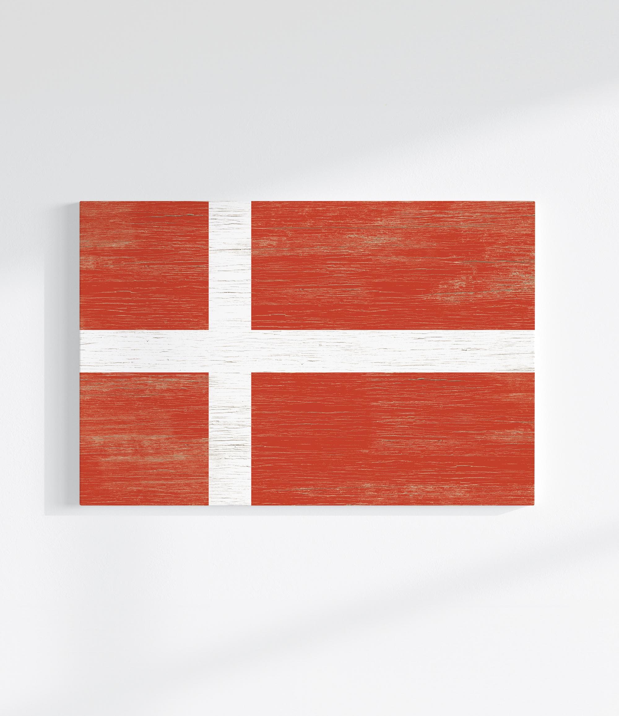 a piece of wood with a flag painted on it