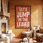 a cozy living room with a rustic wooden wall, a fireplace, and a large wooden sign that reads "Let's JUMP IN THE LEAVES".
