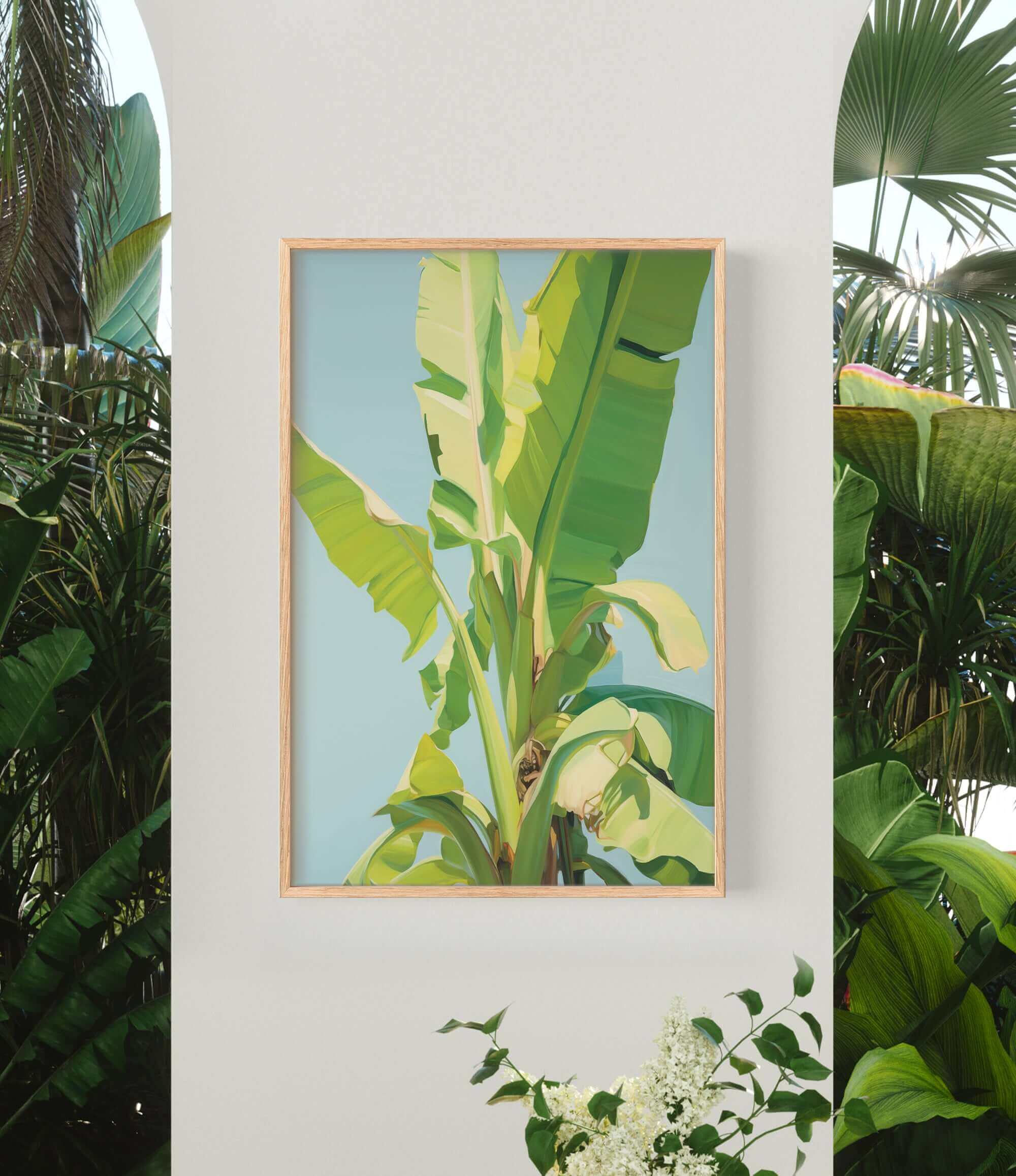 a framed painting of a banana tree with large, vibrant green leaves against a blue background.