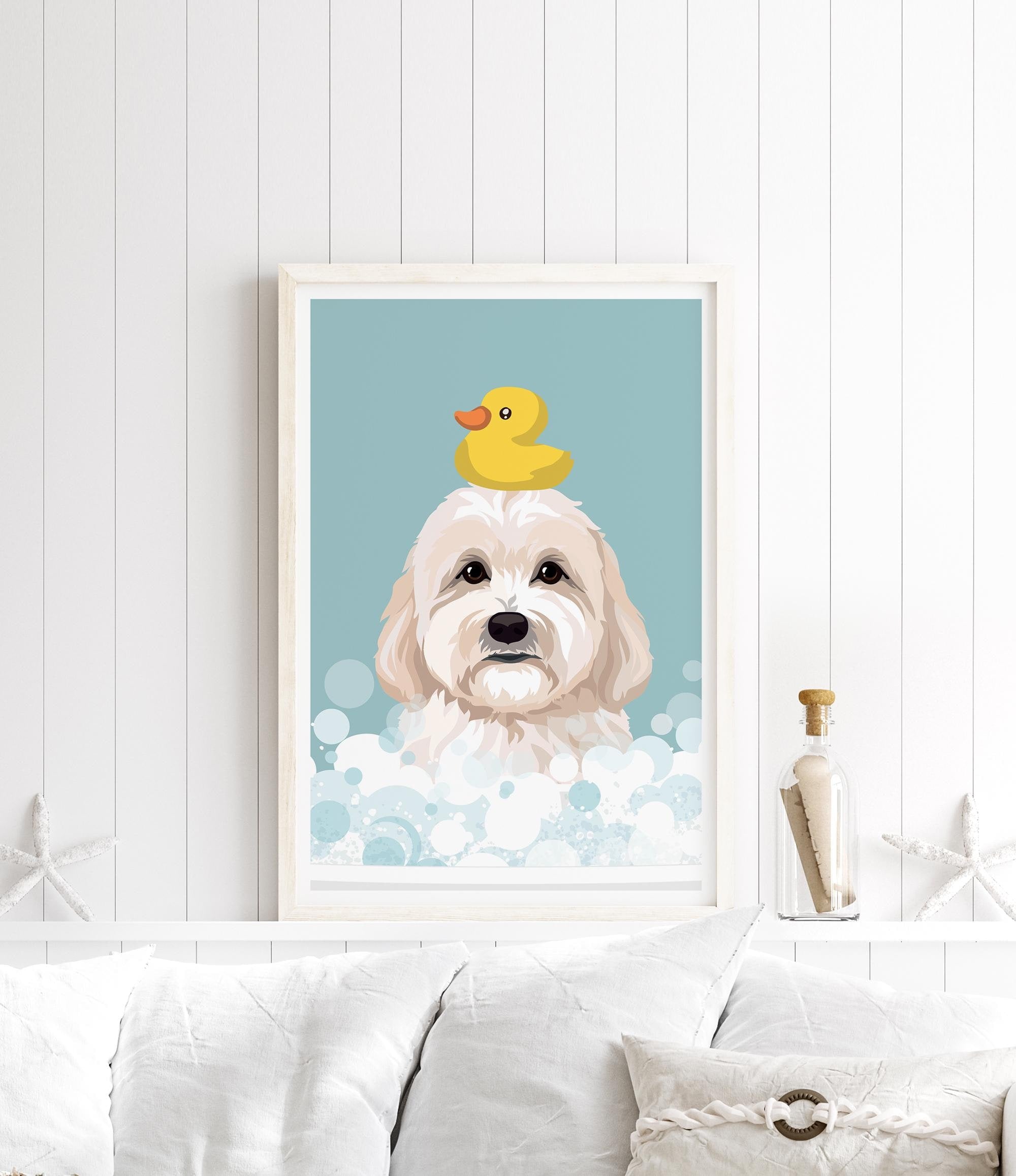 A framed illustration of a dog with a yellow rubber duck on its head, set against a blue background with bubbles.
