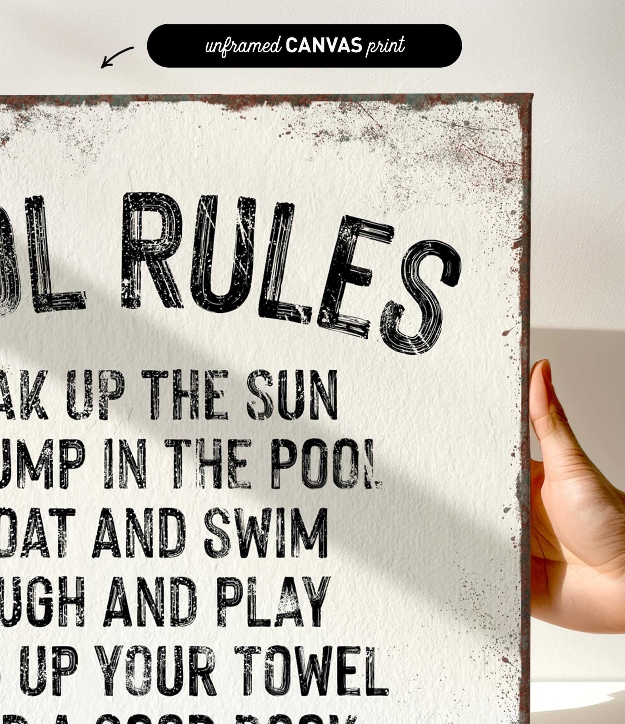 a hand holding a sign that says pool rules