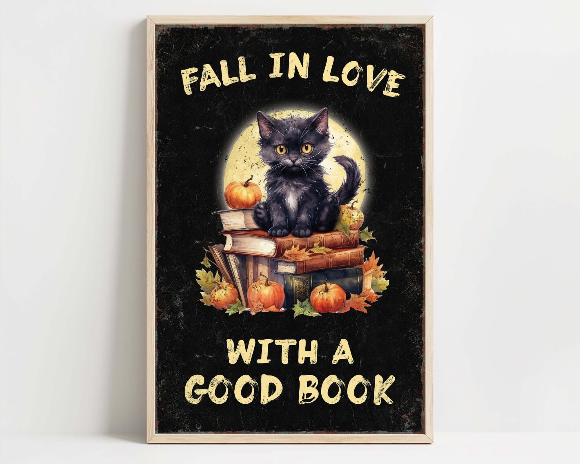 a black cat sitting on top of a pile of books