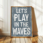 a wooden sign that says let&#39;s play in the waves