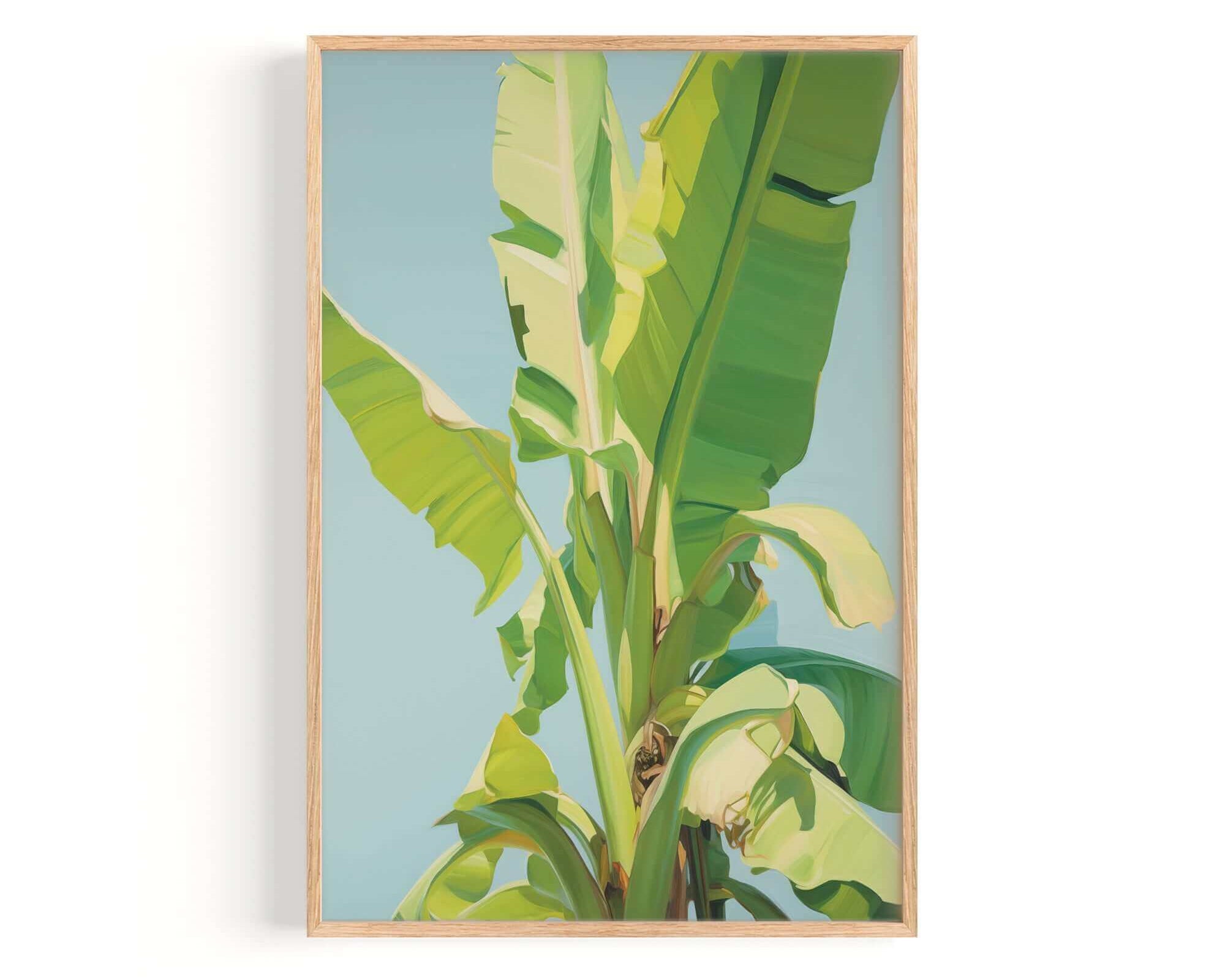 A framed image of a banana tree with large, vibrant green leaves against a blue sky background.