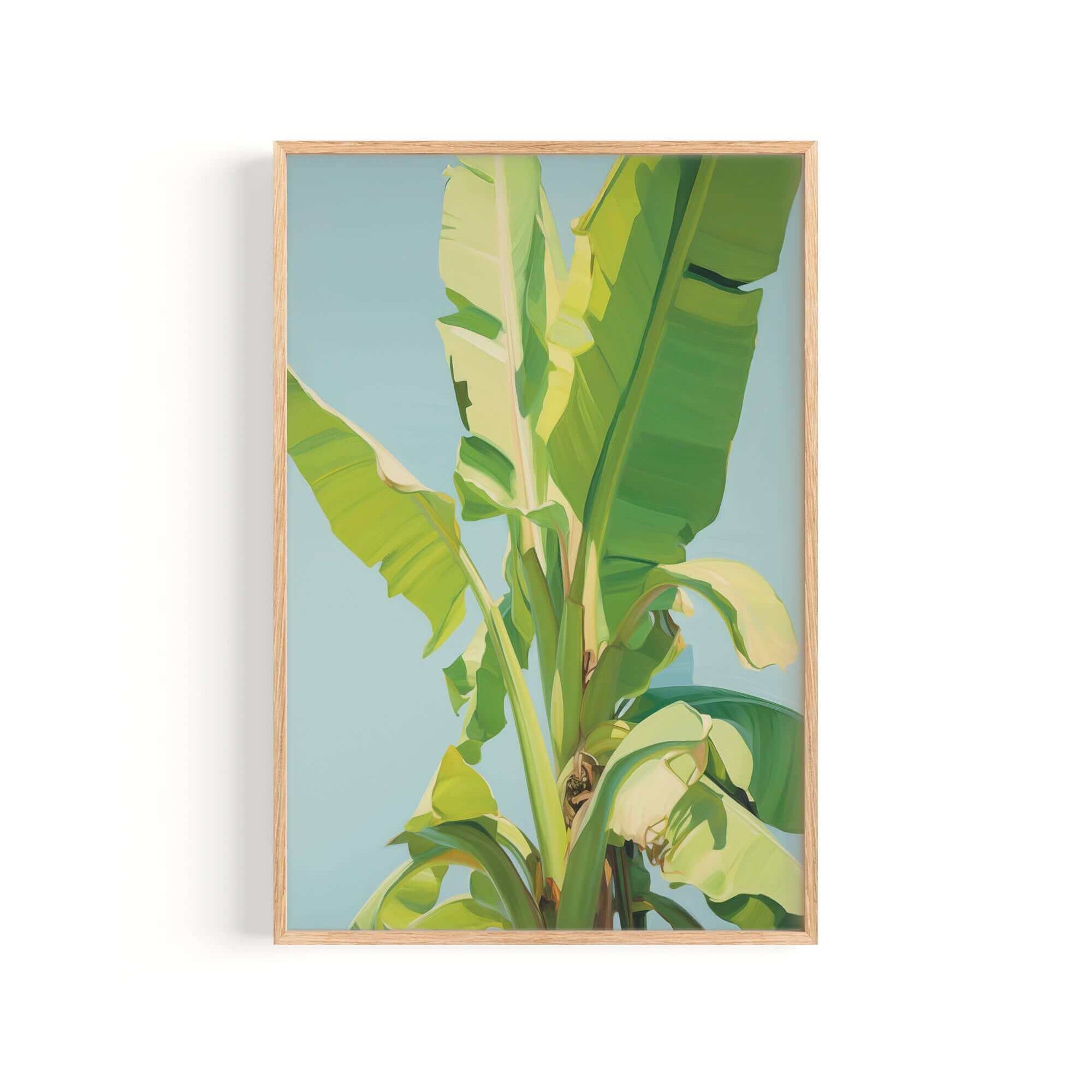 A framed image of a banana tree with large, vibrant green leaves against a blue sky background.