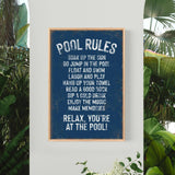 a pool rules sign hanging on the side of a wall