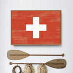 a picture of a red cross on a wall