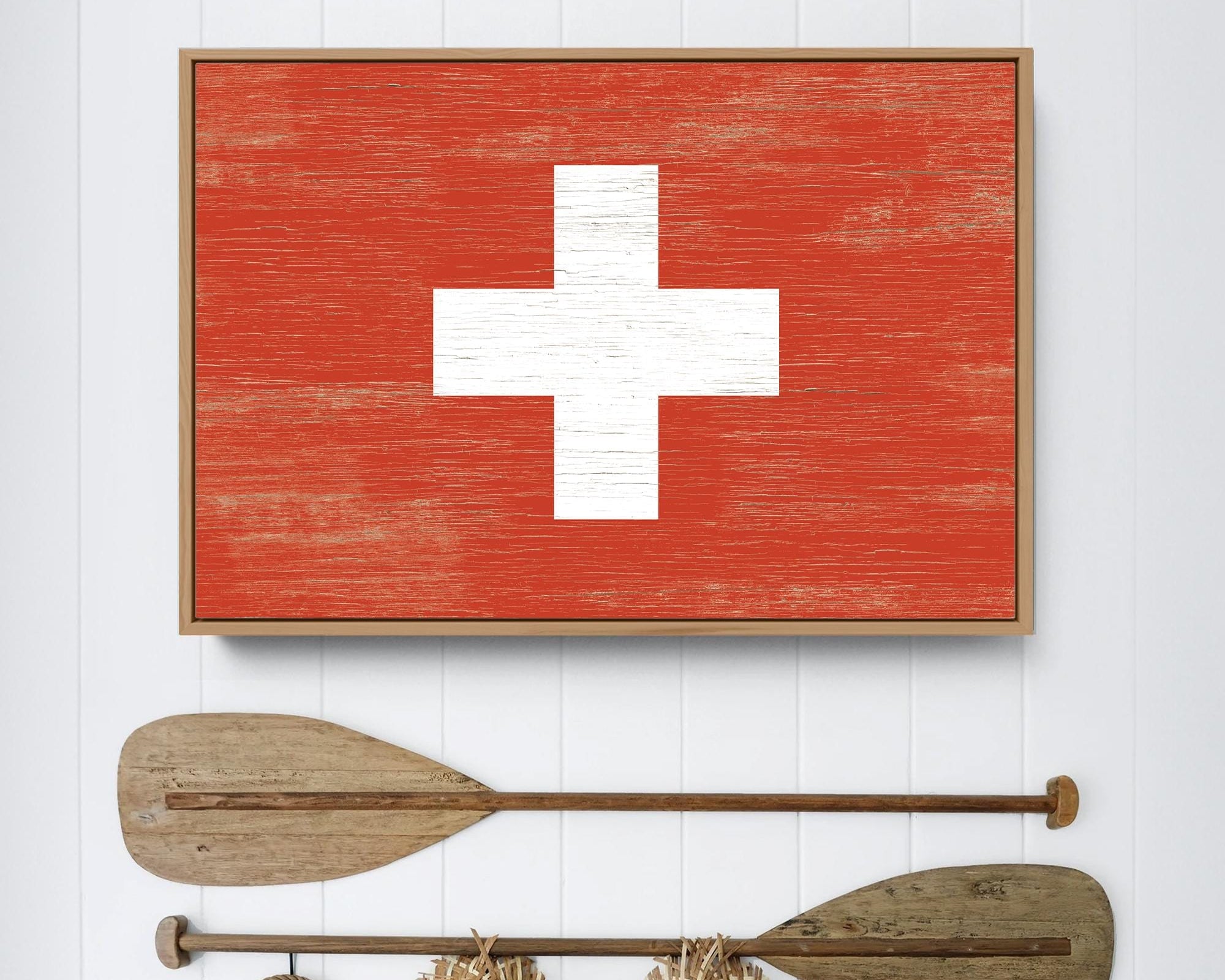 a picture of a red cross on a wall