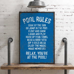 a blue sign that says pool rules on it