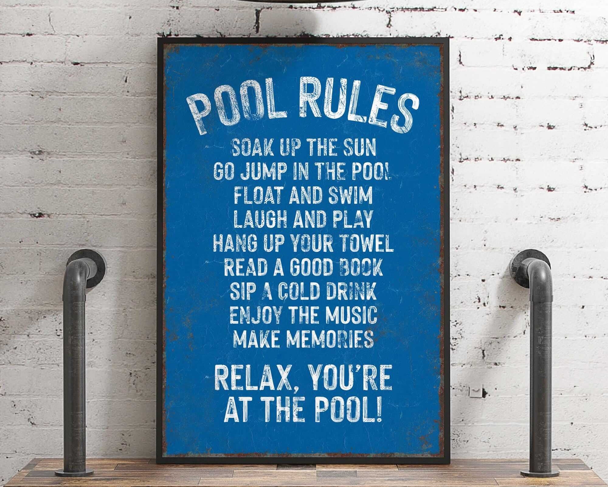 a blue sign that says pool rules on it