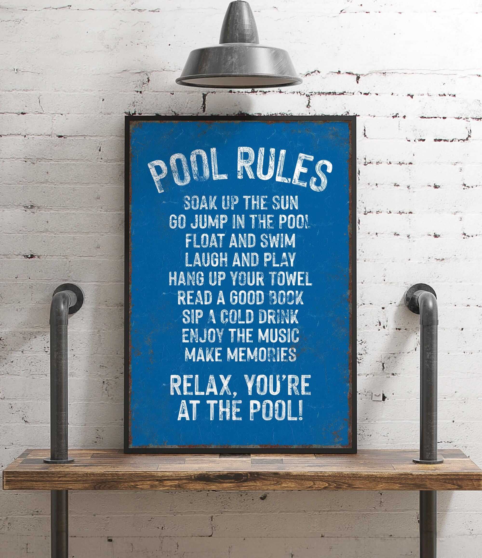 a blue sign that says pool rules on it