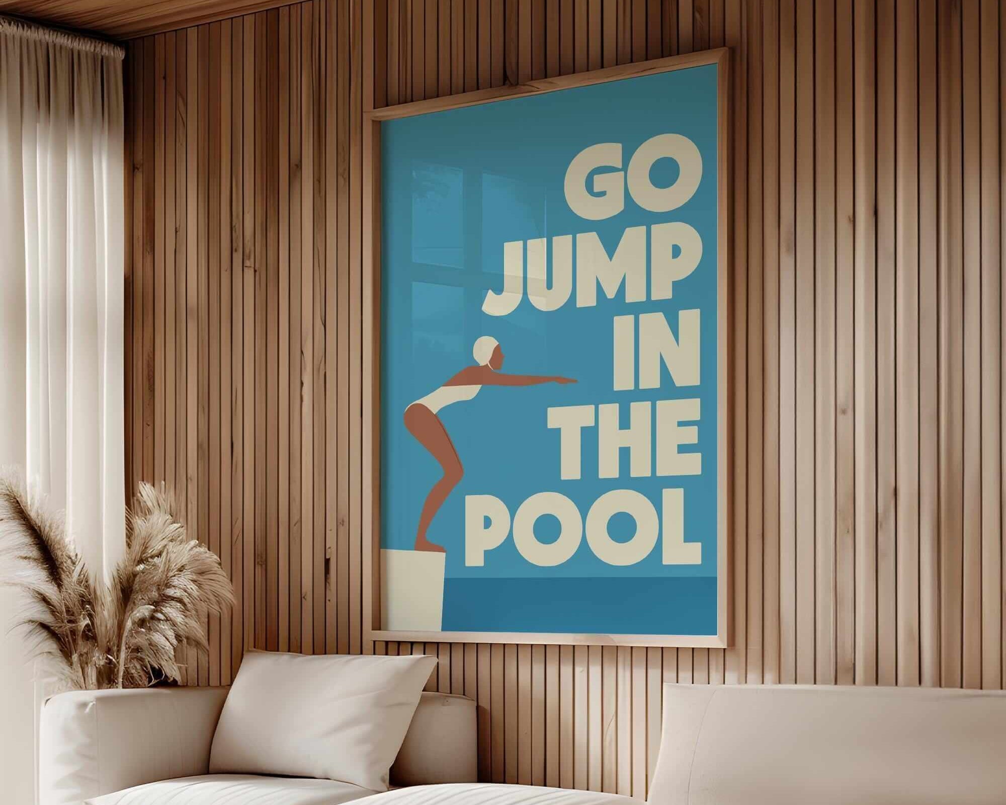 a living room with a large poster on the wall that says "GO JUMP IN THE POOL".