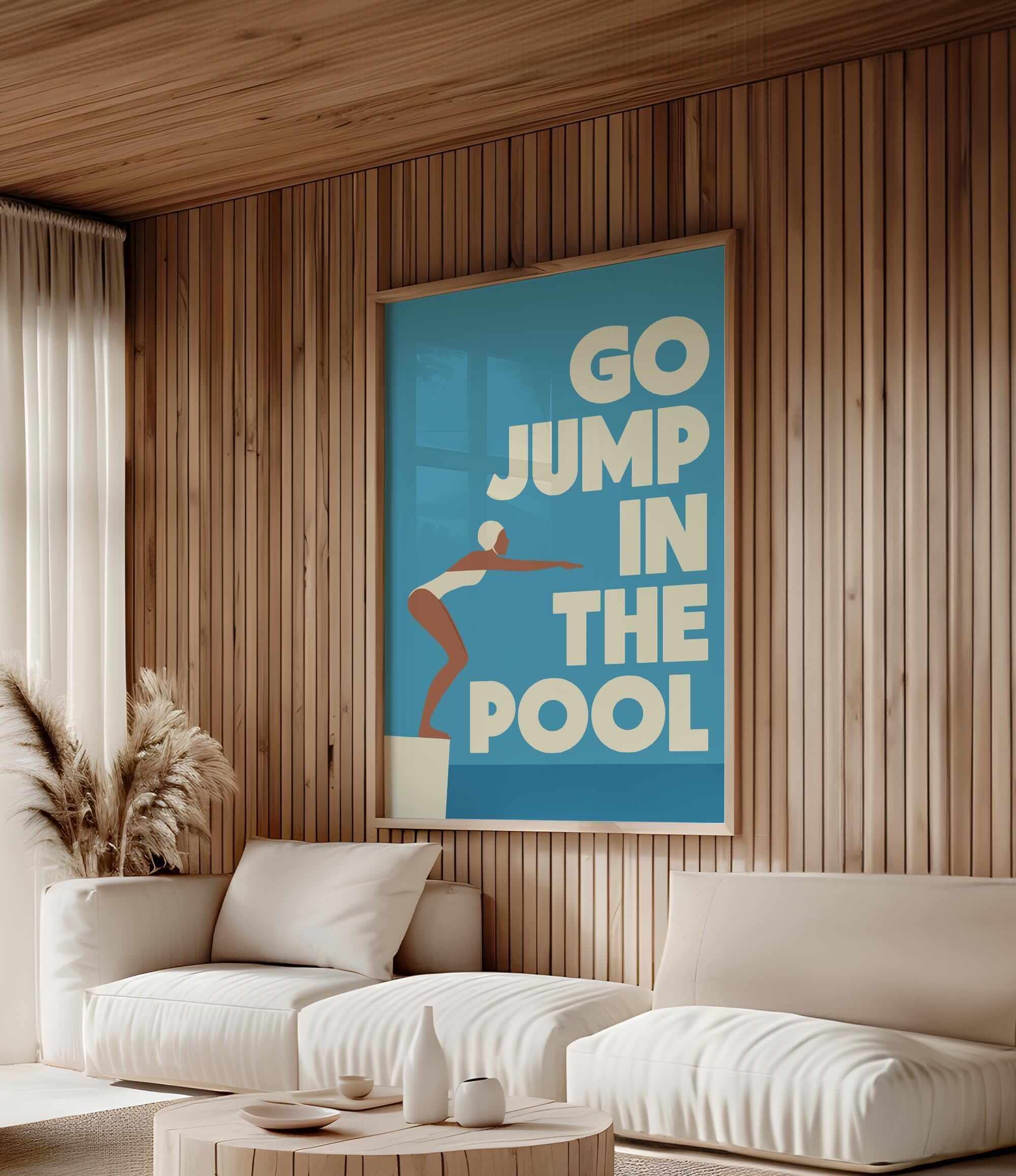 a living room with a large poster on the wall that says "GO JUMP IN THE POOL".