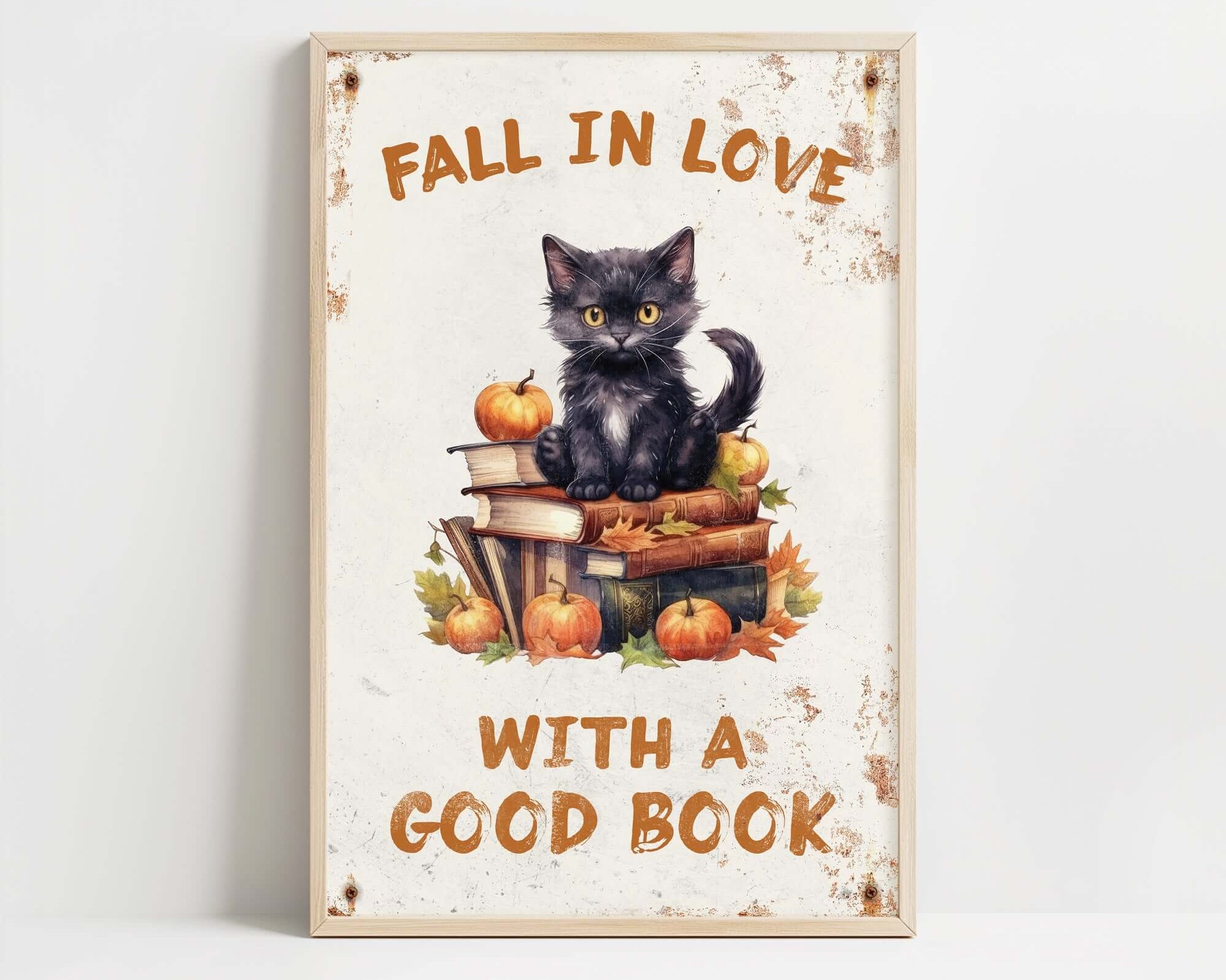 a black cat sitting on top of a pile of books