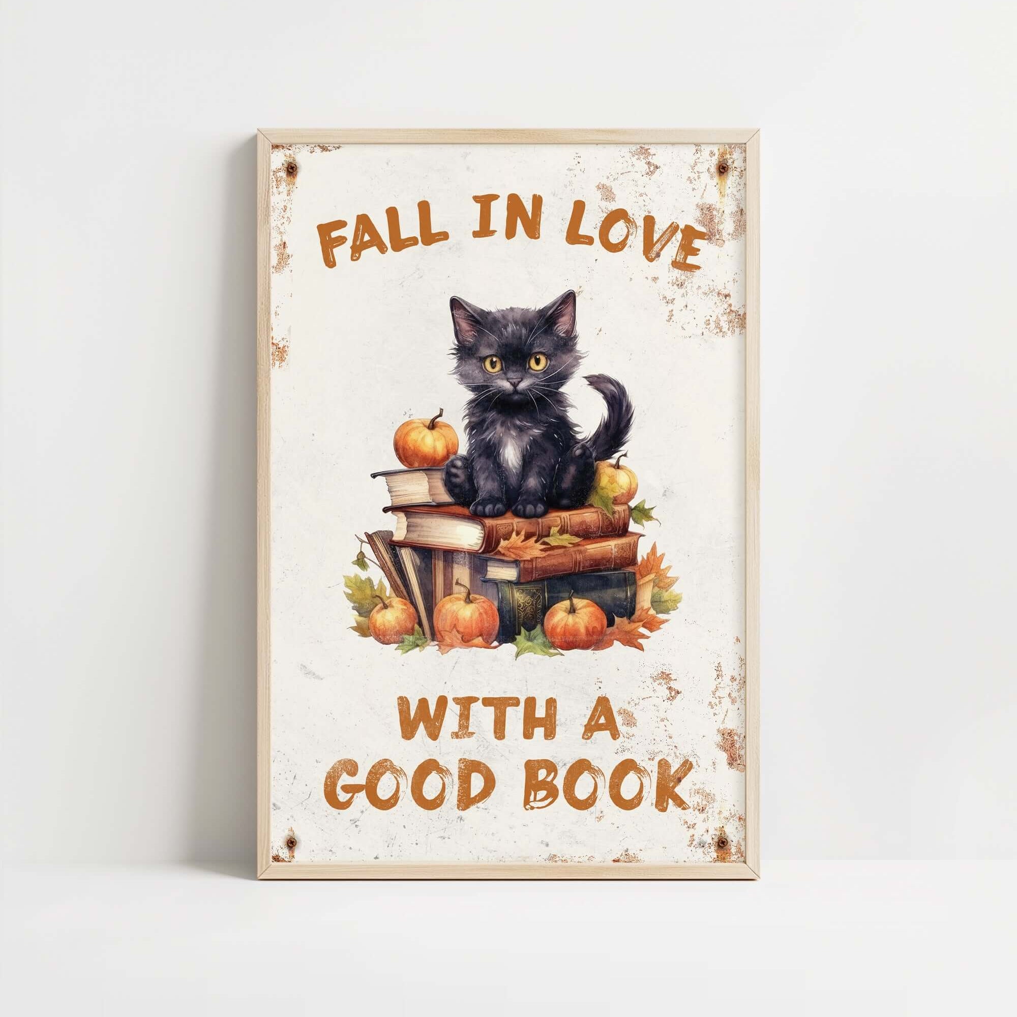 a black cat sitting on top of a pile of books